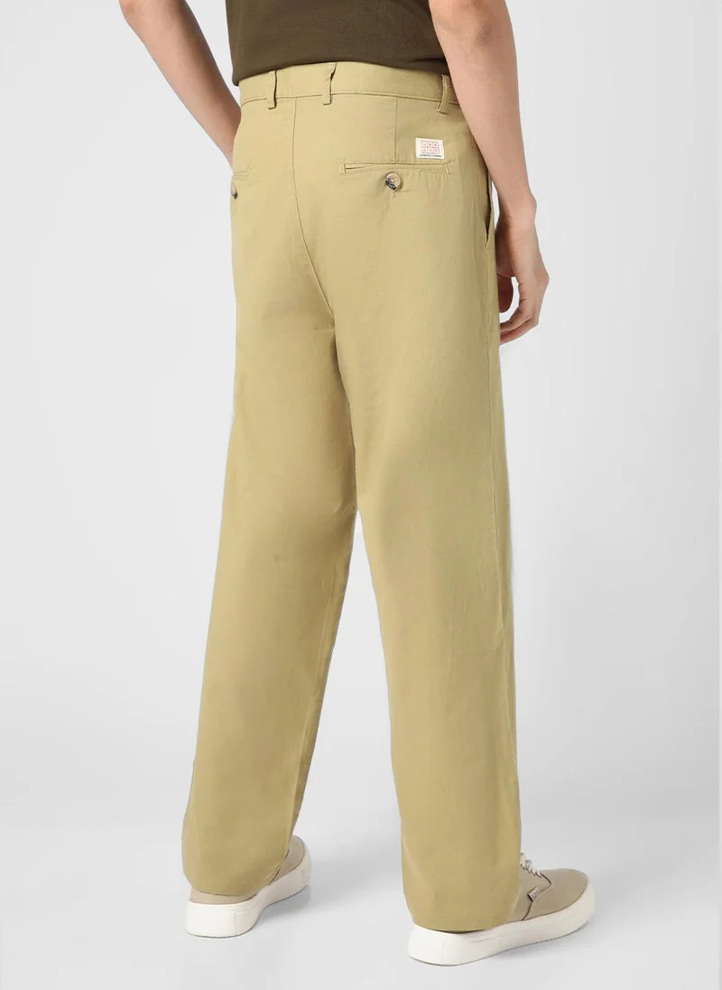 Urbano Fashion  Urbano Fashion Men's Light Olive Loose Baggy Fit Solid Chino Trousers Non-Stretchable for Men | Best Price UAE